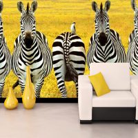 Wall mural with striped zebras on the living room wall