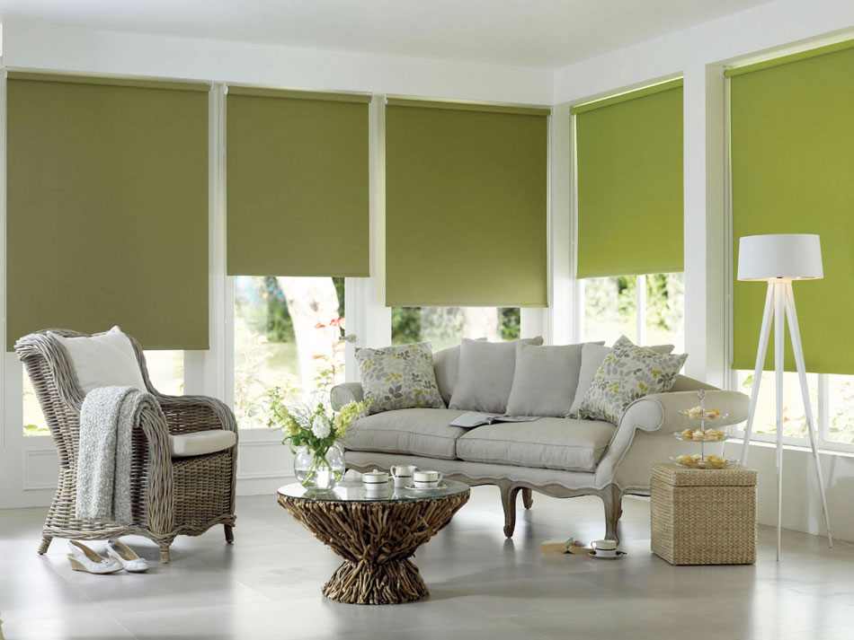 Green roller blinds in a white room
