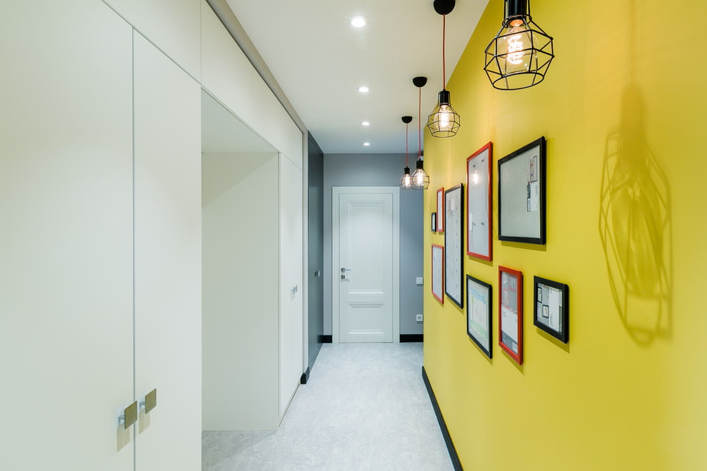 Narrow entrance hall with a yellow wall