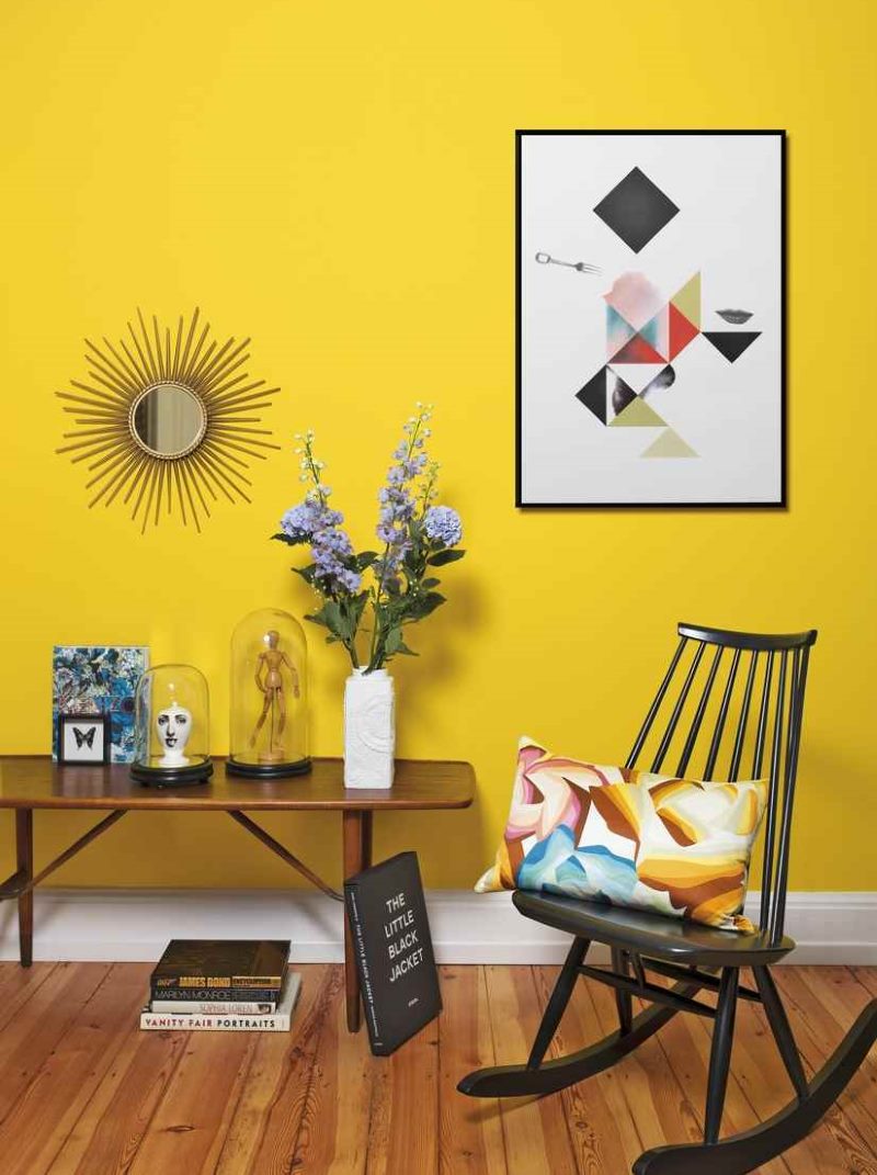 Yellow wall in the interior of the living room