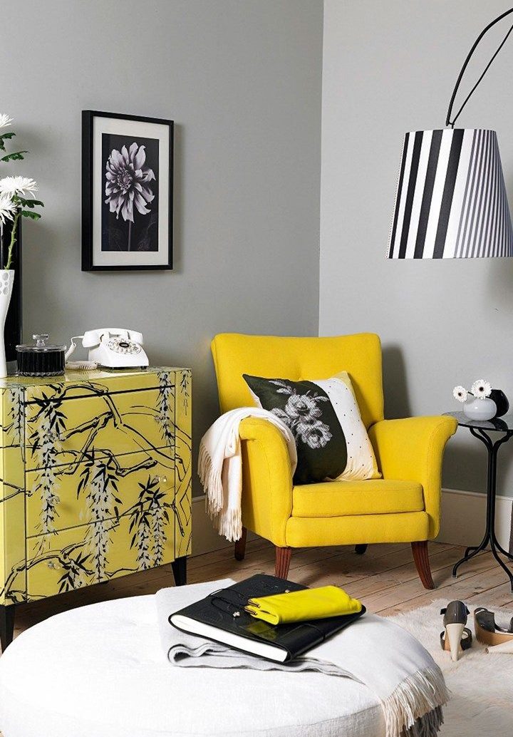 Yellow armchair in the corner of the living room