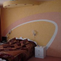 Decorazione murale sopra la testata del letto