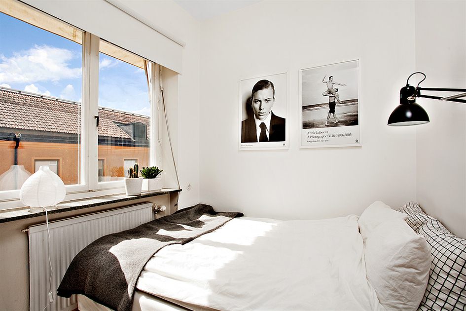 The interior of a small bedroom in a studio apartment