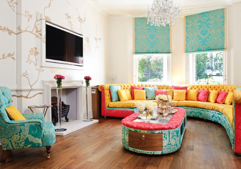 Turquoise curtains in the colorful interior of the living room