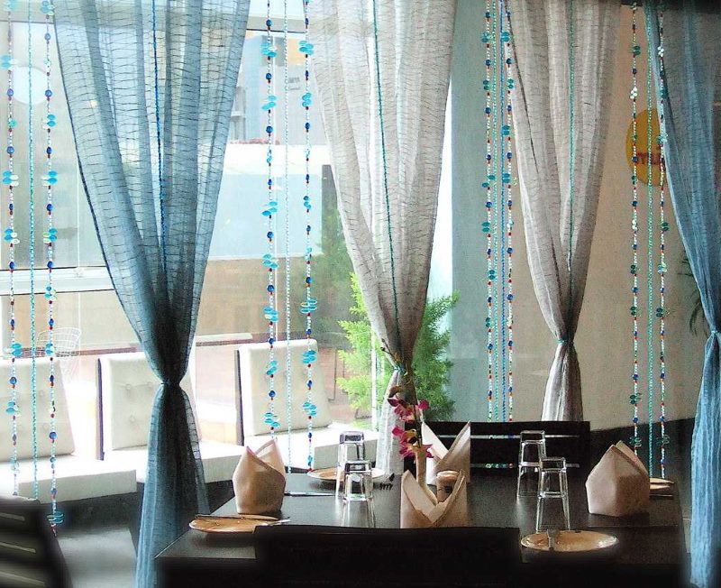 Decorative curtains from tulle and beads