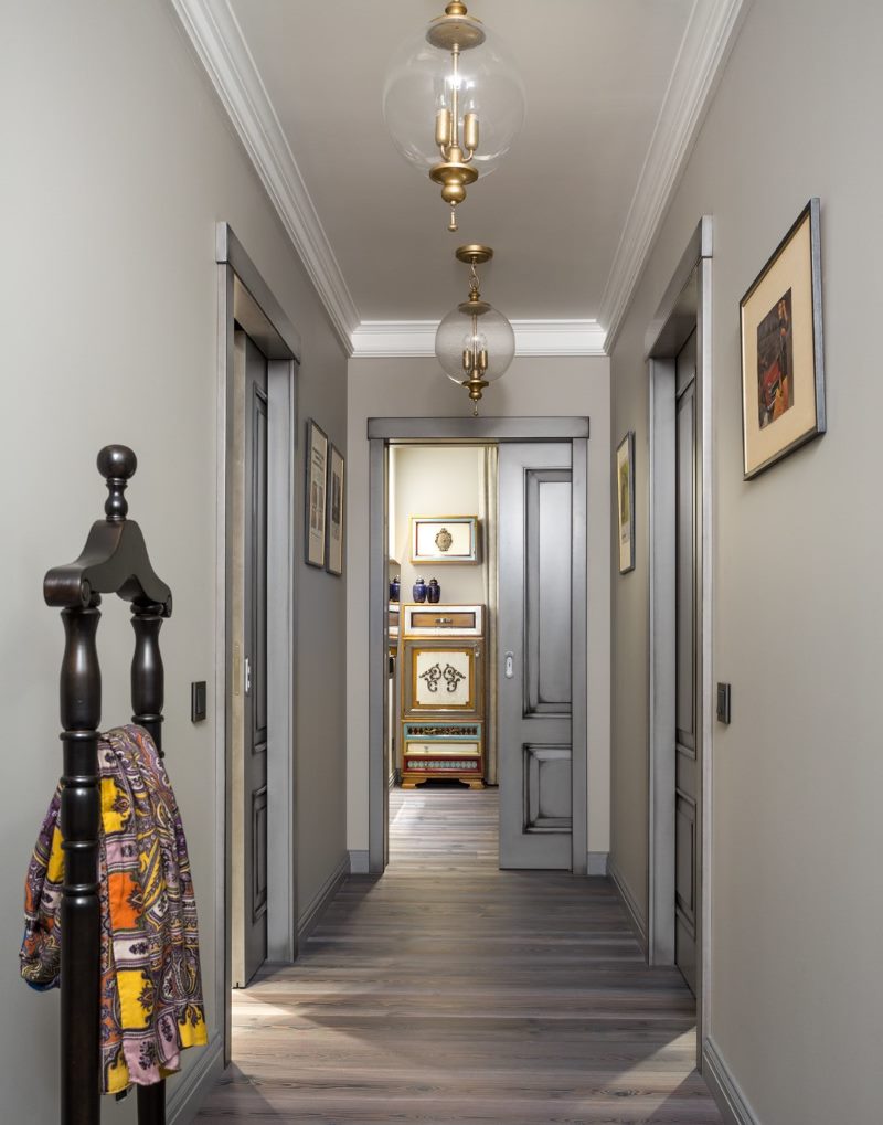 Light gray walls in a narrow corridor