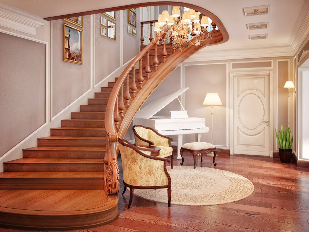 Wide wooden staircase in the lobby of a country house