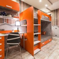 Orange furniture in brother and sister's room