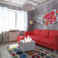 Red sofa in a gray living room