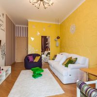 Yellow color in the design of the living room