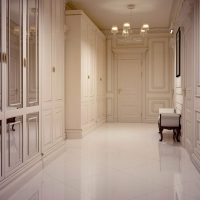White flooring in the interior of the hallway