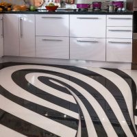 Black and white stripes of flooring in the kitchen