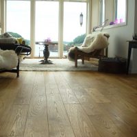 Gray carpet on a wooden floor