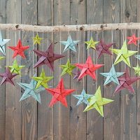 Stick with paper stars of different colors.