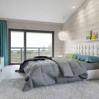 Camera da letto moderna in una casa di legno