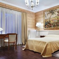 The bedroom in a house made of timber in a classic style