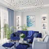 Canapé bleu dans une salle blanche