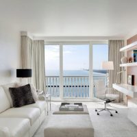 Narrow living room design with balcony