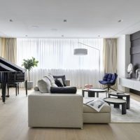 Black piano in the living room interior
