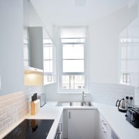 White kitchen with acrylic facades