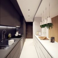 The combination of black and white in a long kitchen