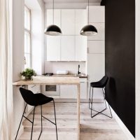 Black wall in the design of the kitchen