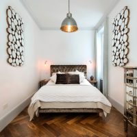 Wooden parquet in an elongated bedroom