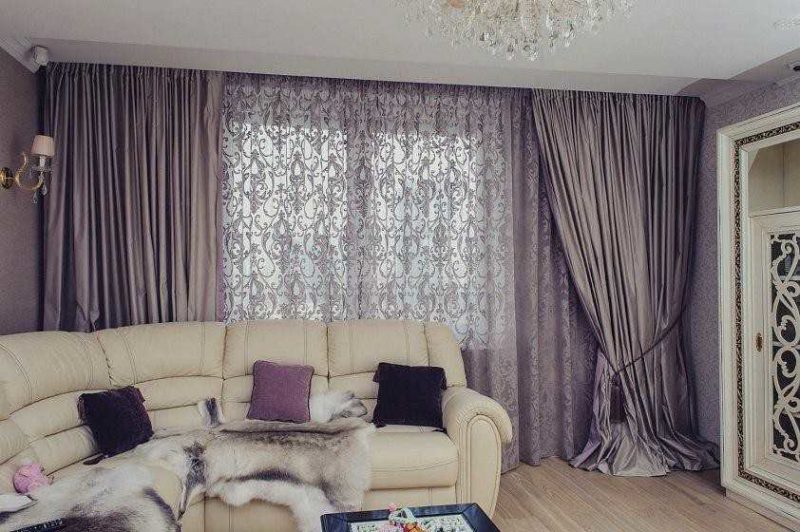 French curtains all over the living room wall