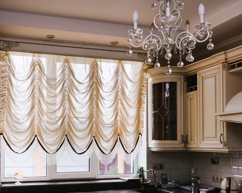 Translucent french curtains in a modern kitchen