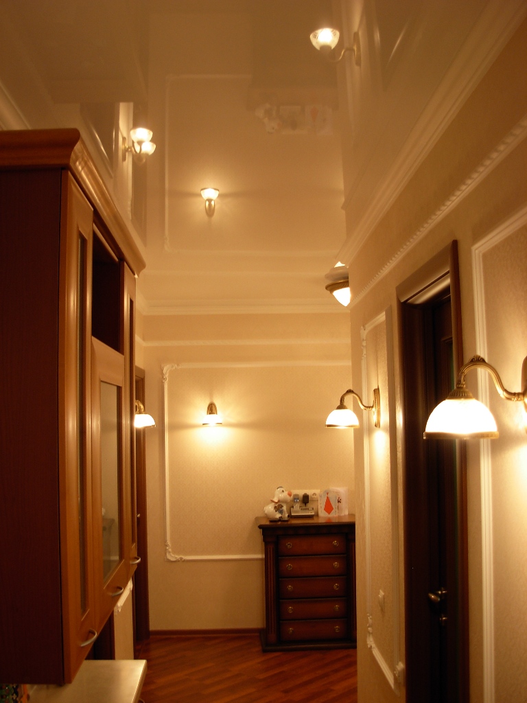 Hallway lighting with glossy stretch ceiling