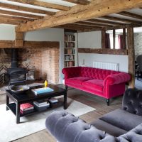 Raspberry velvet sofa
