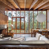 Wooden windows in the frame house