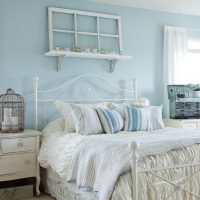 Blue walls in provence style bedroom