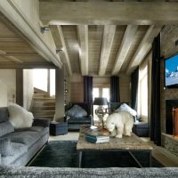 Modern TV with stone fireplace