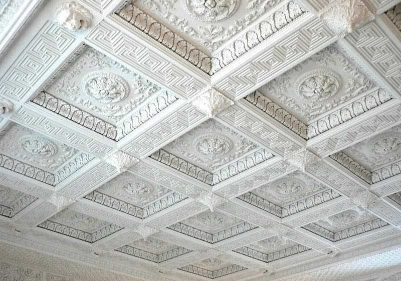 White coffered ceiling with stucco moldings
