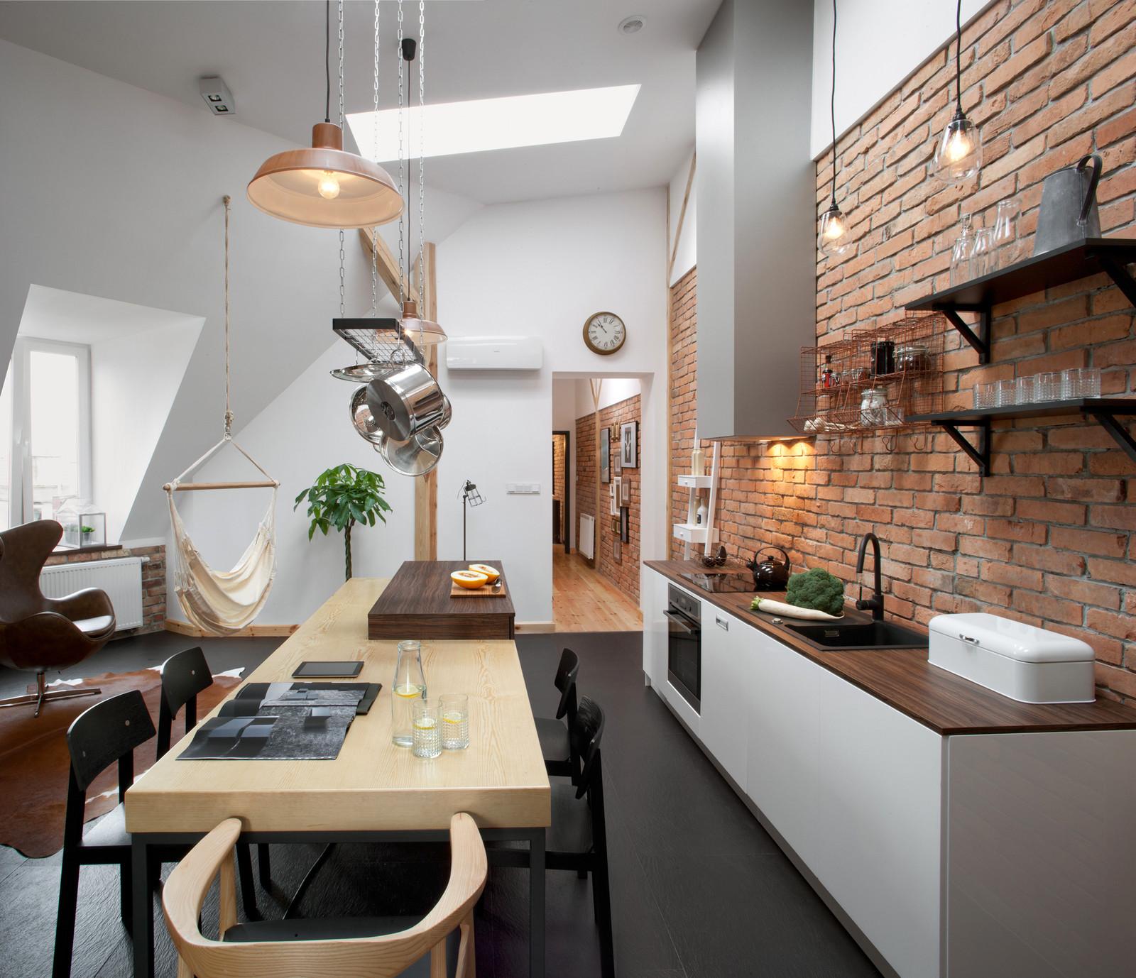 Kitchen work area along a brick wall
