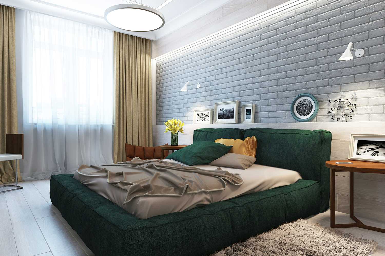 Dark green bed in the bedroom with a brick wall