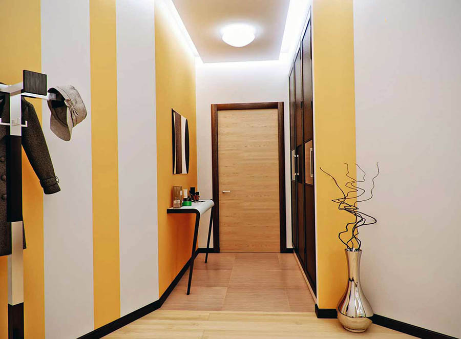 Light yellow walls in a narrow corridor