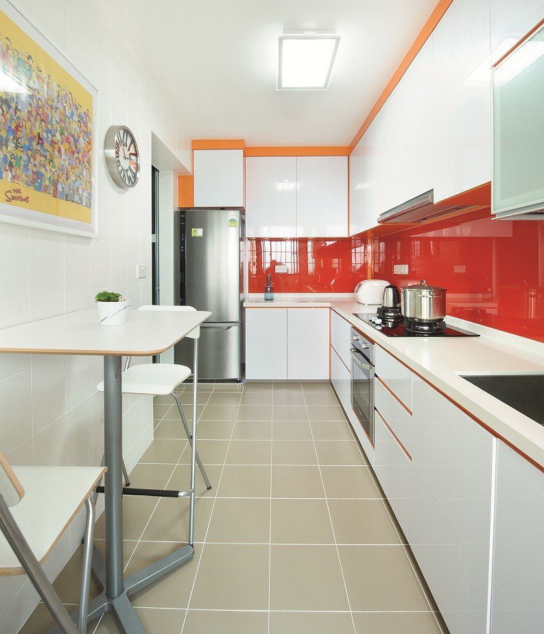 Red glossy apron in a white kitchen