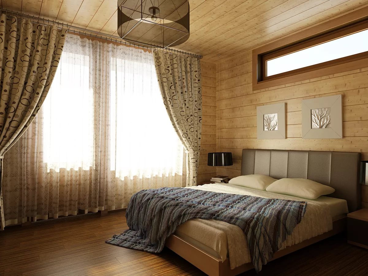 Couvre-lit gris dans un lit dans une maison privée