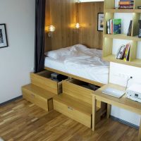 Bed with drawers made of laminated particleboard