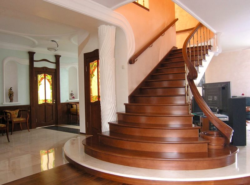 Wooden staircase in a townhouse design