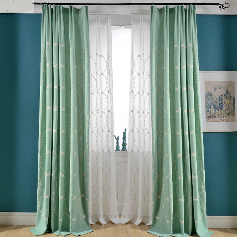 Mint curtains on the window in the living room