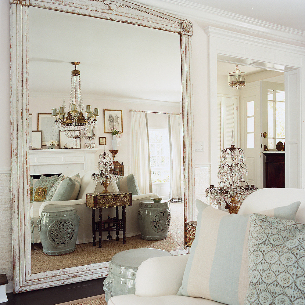 Large floor mirror in a wooden frame