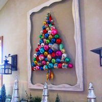 Christmas tree on the wall made of mirror balls