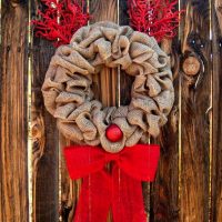 Burlap wreath on a wooden gate