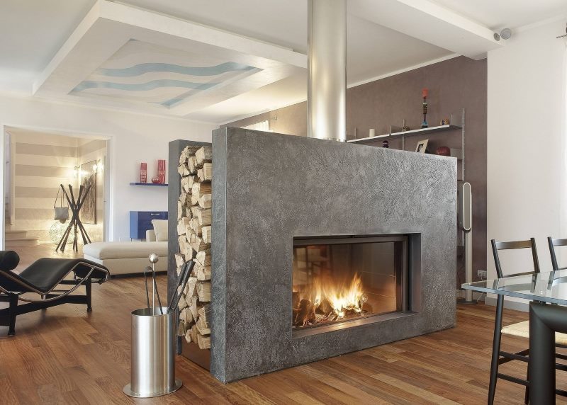 Concrete wall fireplace in a modern living room