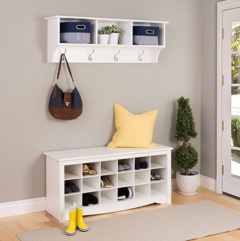 White cabinet with small compartments for storing shoes
