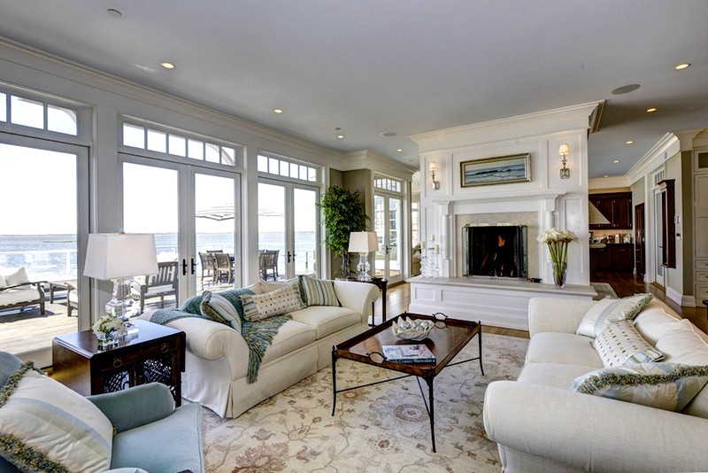 Living room with panoramic windows and a fireplace