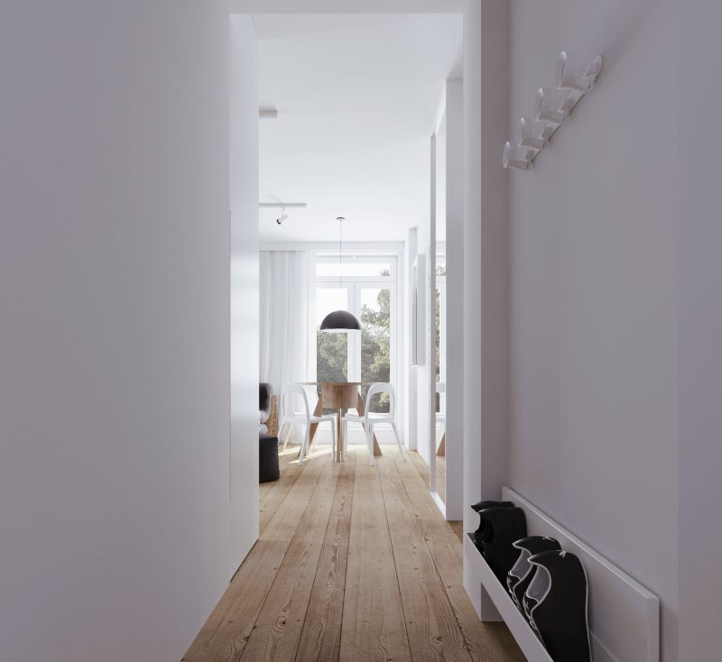White walls of a narrow hallway in a minimalist style.
